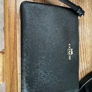 New unused Coach wrist clutch